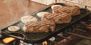 Lodge Cast Iron Griddle w:Steaks Featured Lodge Cast Iron Griddle w:Steaks Featured