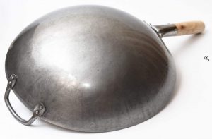 Round bottomed wok, bottom view Round bottomed wok, bottom view
