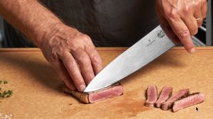 Victorinox chef knife cutting beef Victorinox chef knife cutting beef