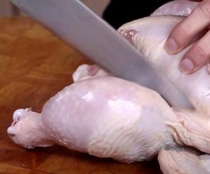 Victorinox knife cutting up a chicken Victorinox knife cutting up a chicken