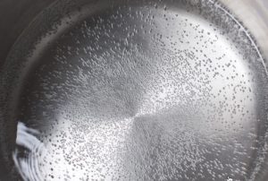 Caraway frying pan with water bubbles Caraway frying pan with water bubbles